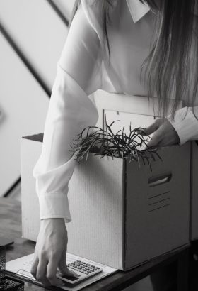 high-angle-woman-with-cardboard-box