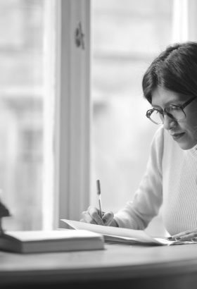 young woman works on a school search